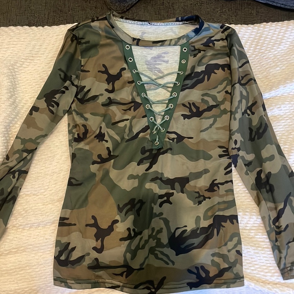 Lace up long sleeve. Worn once